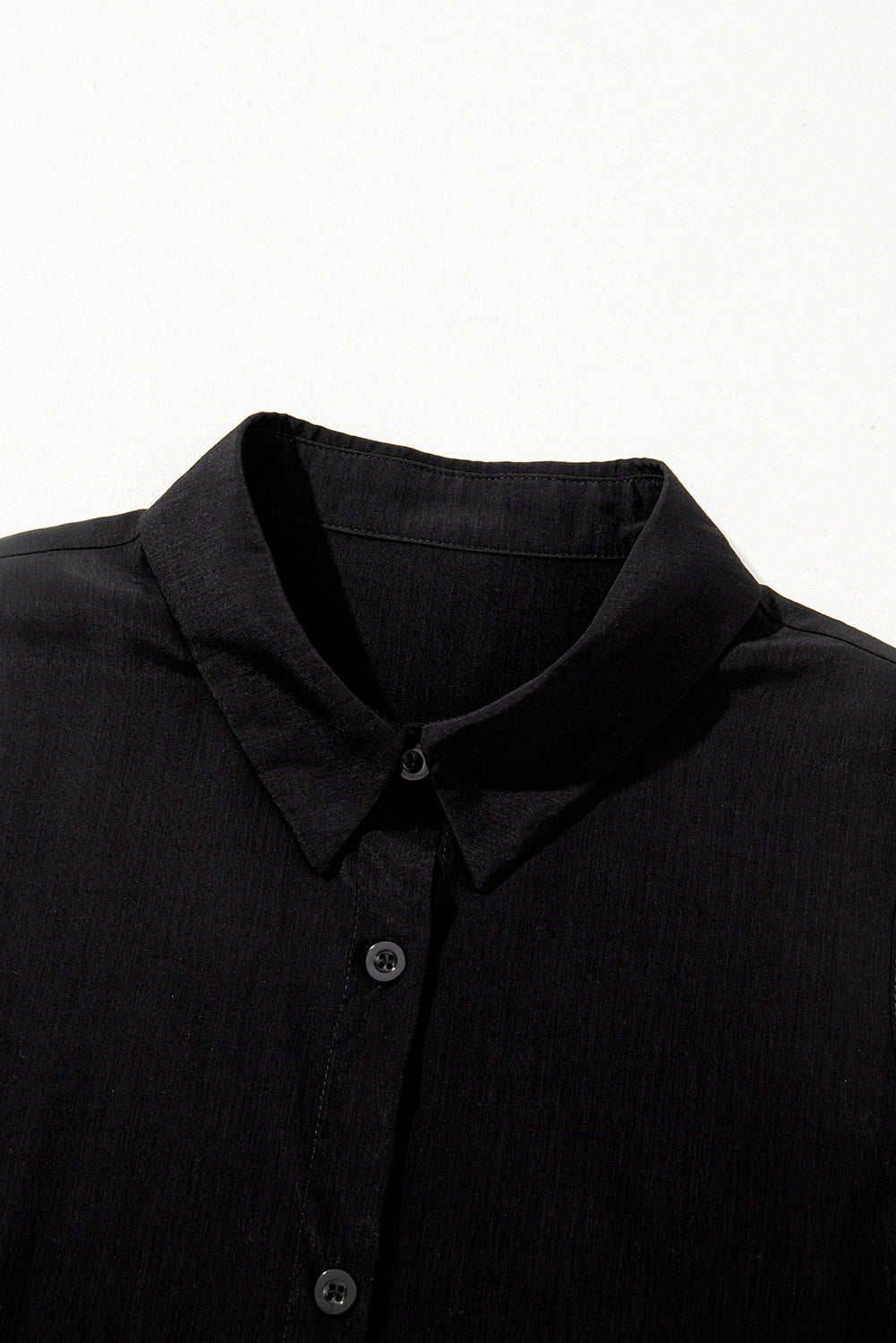 Black Sleeveless Buttoned Front Ruffle Hem Tunic Shirt