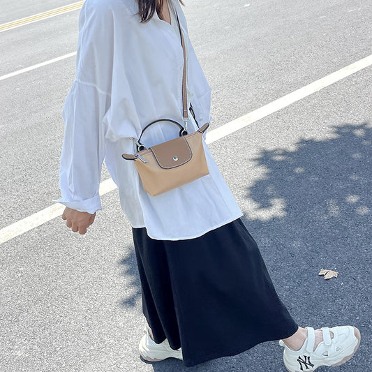 Retro fashion versatile women's bag, shoulder crossed, carrying high-end nylon dumpling bag